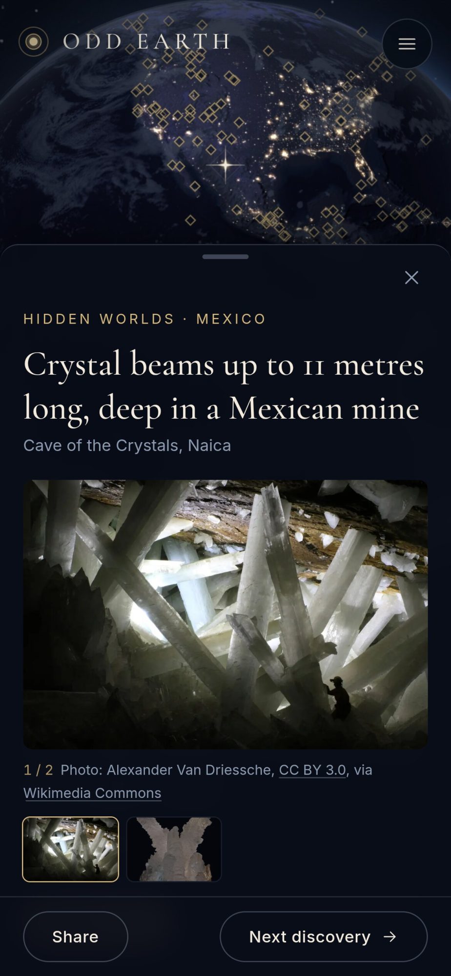 Odd Earth on a phone, with the Cave of the Crystals story in a sheet over the globe